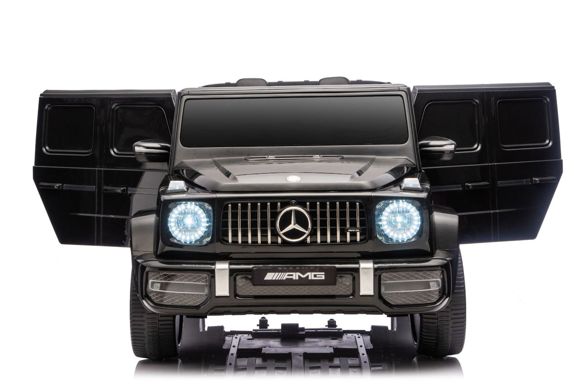 Elektrisches Kinderauto Mercedes-Benz G63 AMG 4x4, Zweisitzer, schwarz, MP3-Player mit USB/AUX- und Bluetooth-Anschluss, Allradantrieb (4x4), Lithium-Batterie, EVA-Räder mit Federung